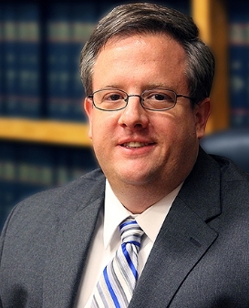 John T. Brost